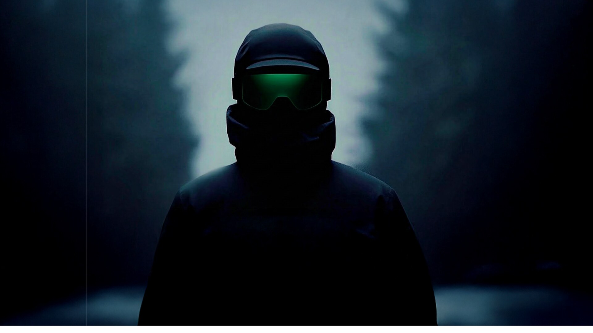 Hooded figure in goggles glowing with Quandry green